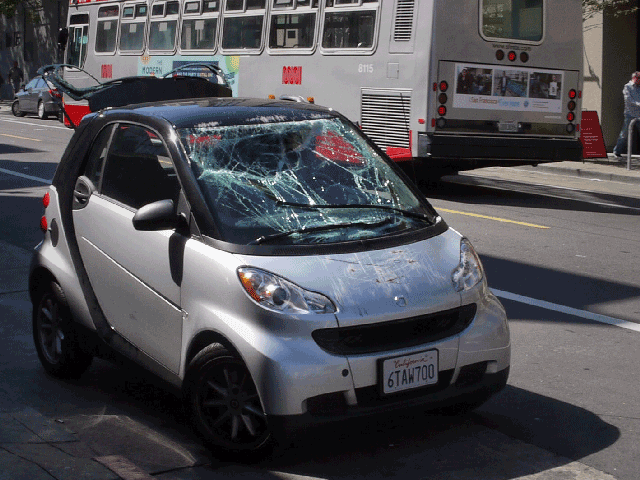 smart car tipping animated gif