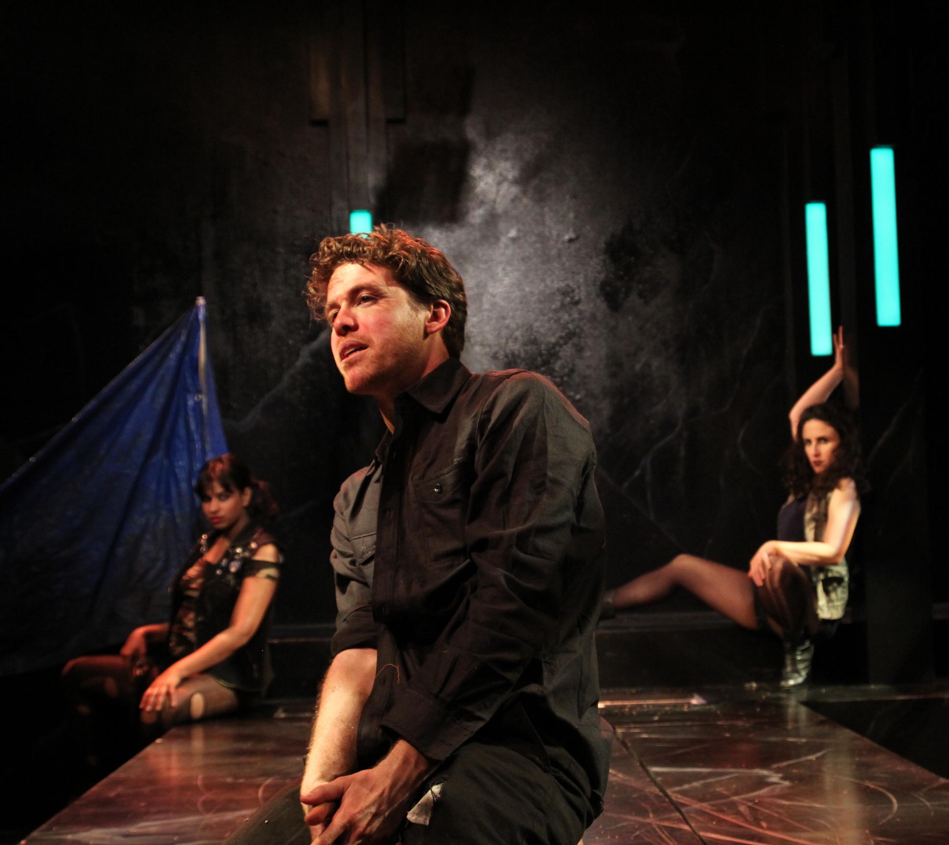Timon (Brennan Pickman-Thoon, center) laments the power of gold to corrupt while Phynia (Radhika Rao, left) and Timandra (María Ascensión-Leigh, right) look on. Photo by Rob  Melrose
